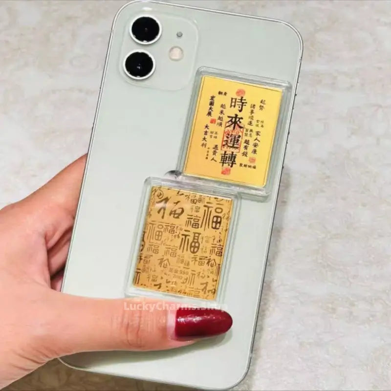 999 pure gold foil fortune phone sticker showing turn-of-luck Chinese calligraphy talisman.