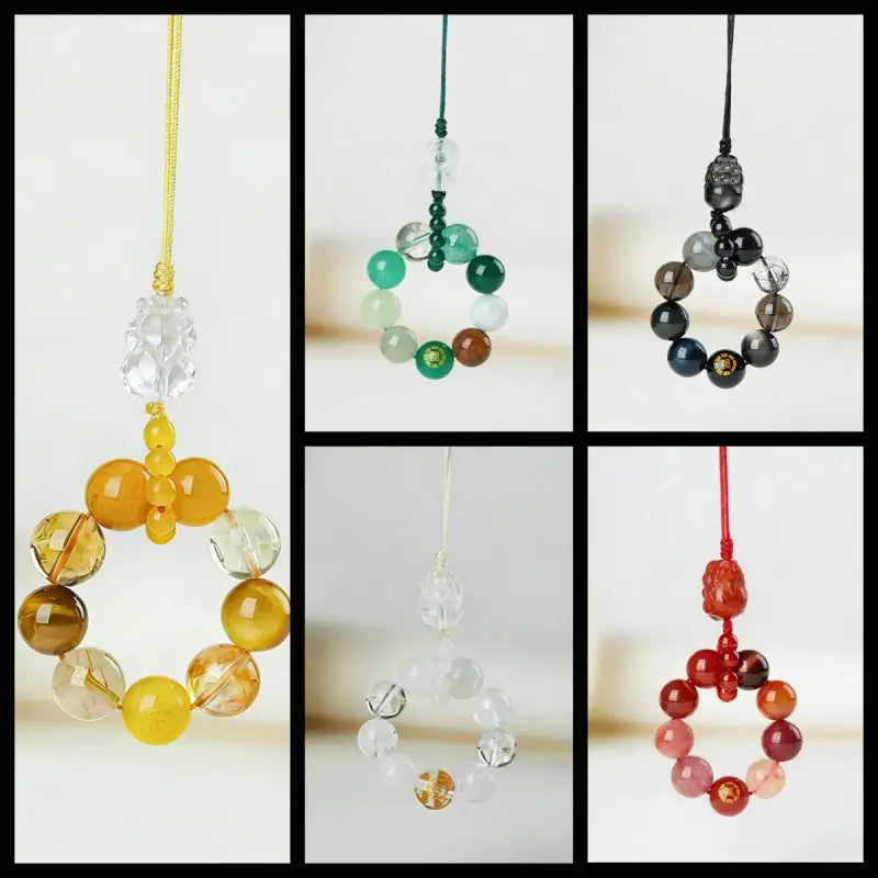 Five variants of natural gemstone Pixiu phone charms for Metal, Wood, Water, Fire, and Earth elements.