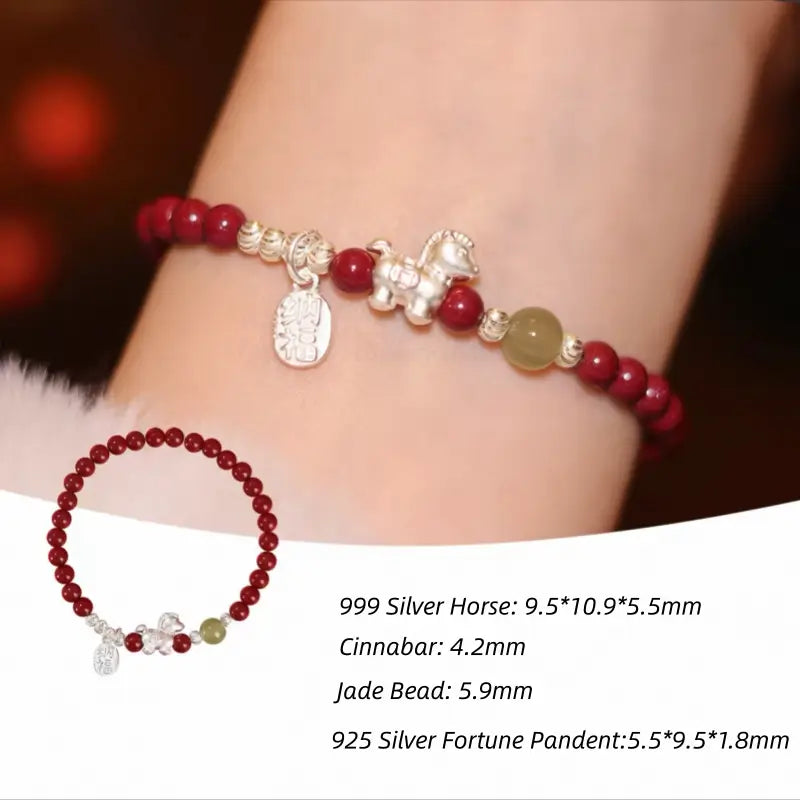 Red cinnabar bead bracelet featuring 999 silver Horse charm, jade bead, and 925 silver Fortune pendant tag.
