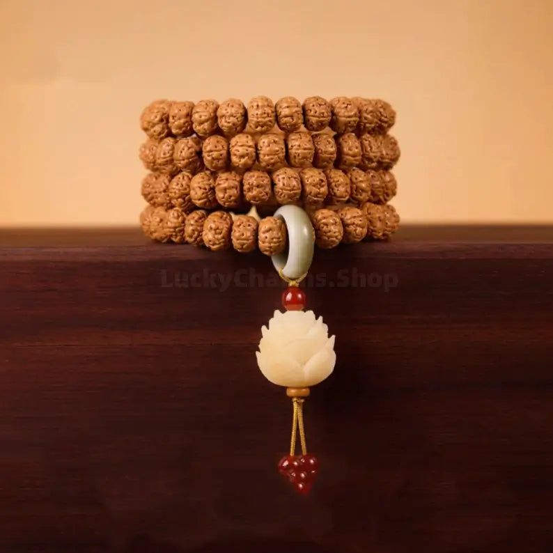 Indonesian natural Rudraksha 108 bead multi-layer bracelet with jade ring accent and carved lotus flower pendant.