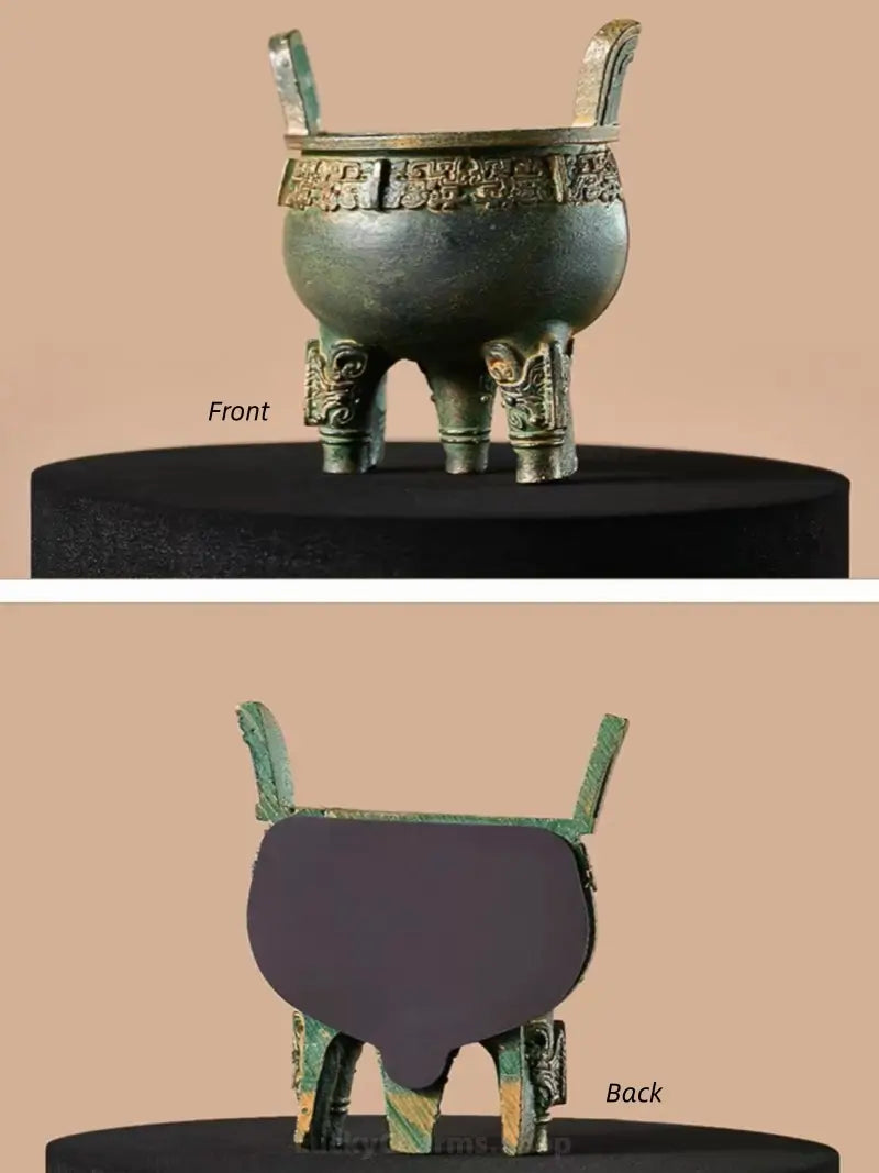 Front and back view of a 3D resin antique Chinese bronze ding tripod vessel fridge magnet.