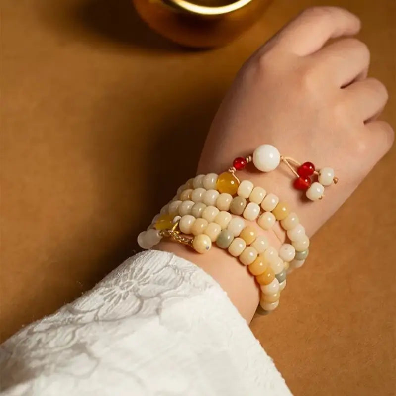 Nationalbibliothek „Reicher Jade- & Gold“-Bodhi-Wurzel-Edelstein-Wickelarmband