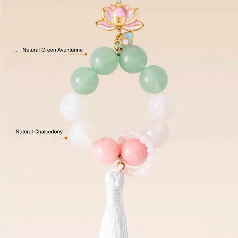 Diagram showing natural green aventurine and white chalcedony beads on lotus tassel phone charm.