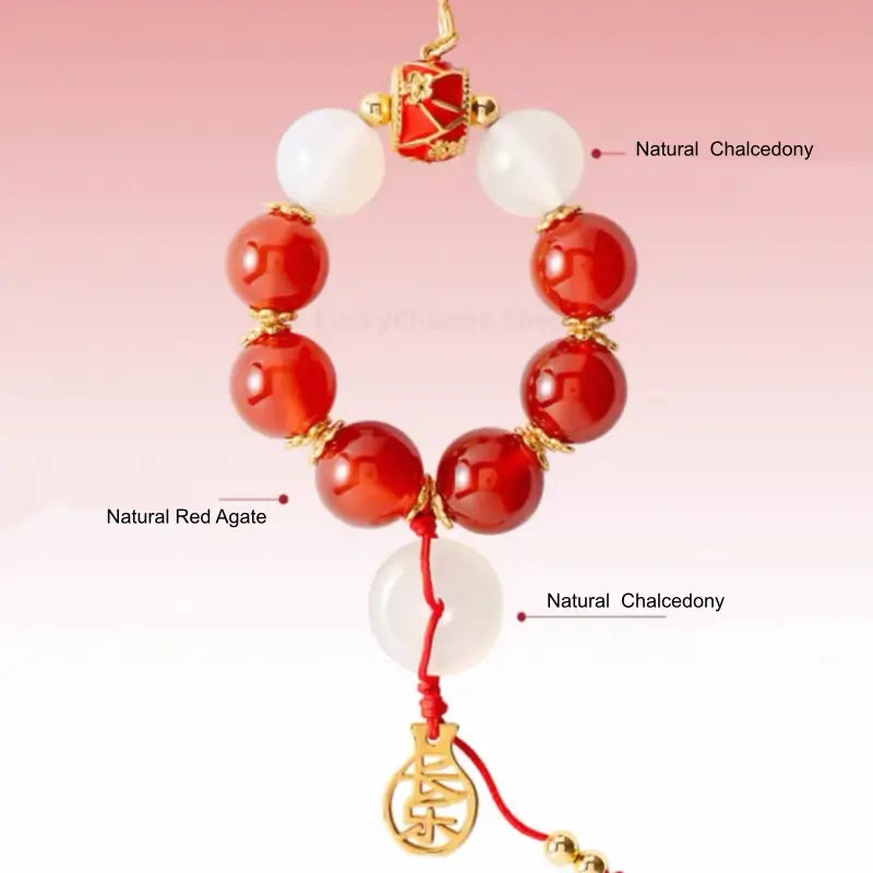 Material breakdown diagram showing natural red agate and chalcedony beads on red phone strap.