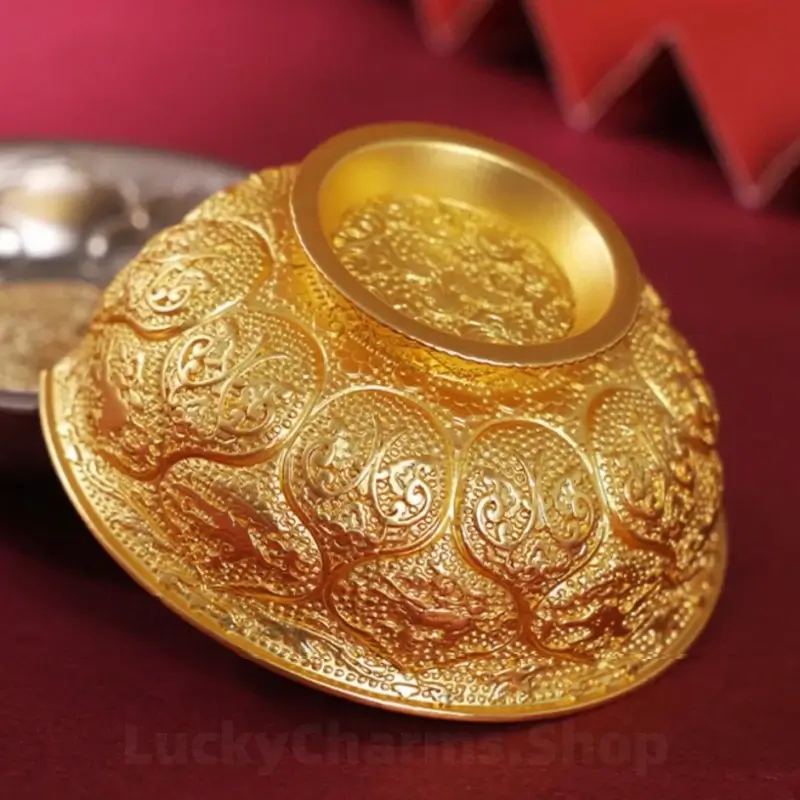 Angled side view showing detailed 3D filigree engravings on traditional gold bowl magnet.