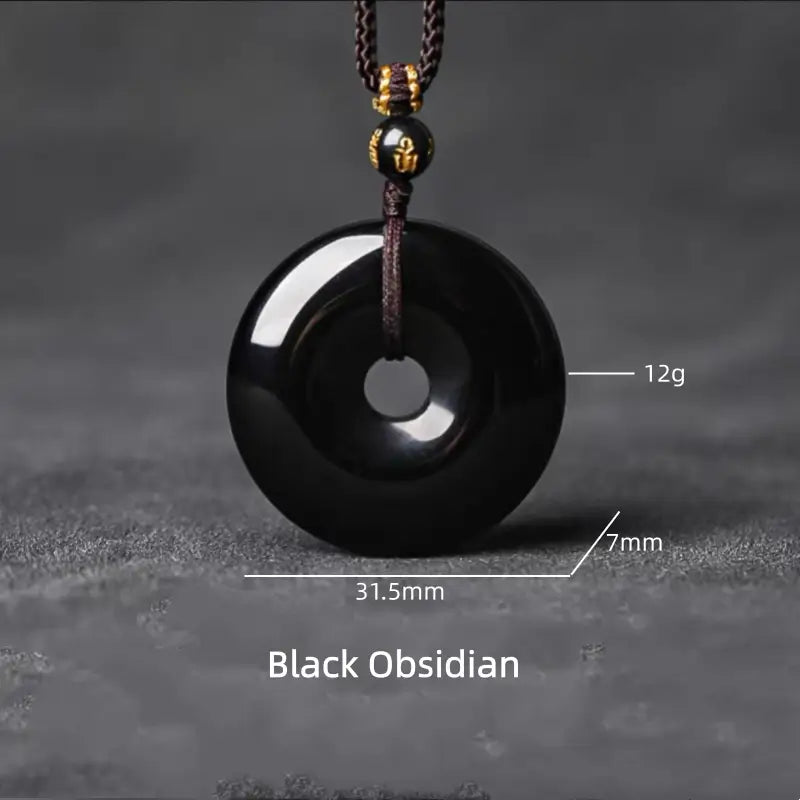 Natural black obsidian peace buckle donut pendant necklace with product dimensions and weight specs.