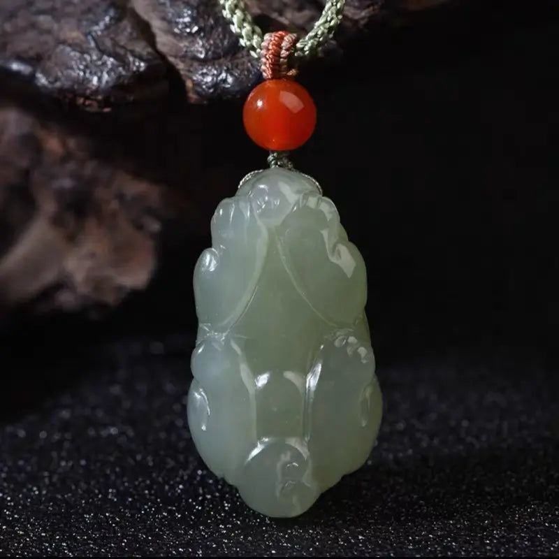 Back carving details of light green Hetian nephrite jade Pixiu pendant necklace.