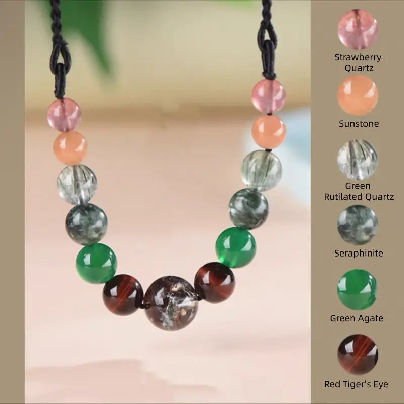 Wood Fire element necklace with strawberry quartz, sunstone, green rutilated quartz, and red tiger's eye.