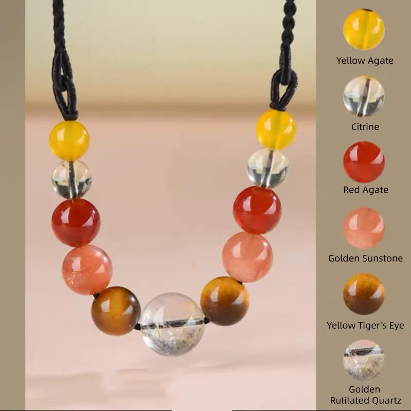 Fire Earth element necklace with yellow agate, citrine, red agate, sunstone, and golden rutilated quartz.