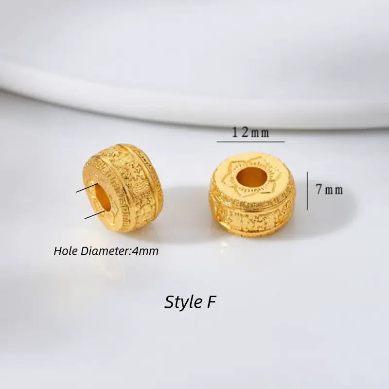 Style F carved gold-plated wheel barrel bead for DIY jewelry accessories. 12x7mm with 4mm hole.