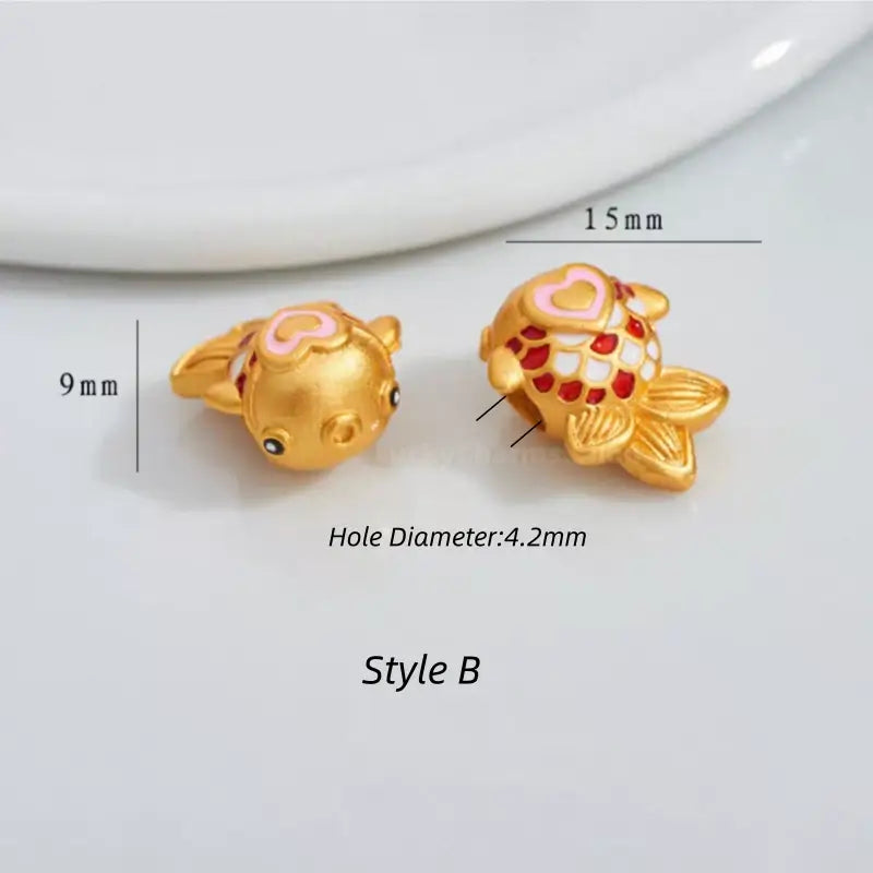 Gold fish charm bead with pink heart and red-white enamel scales, 15mm x 9mm (Style B).