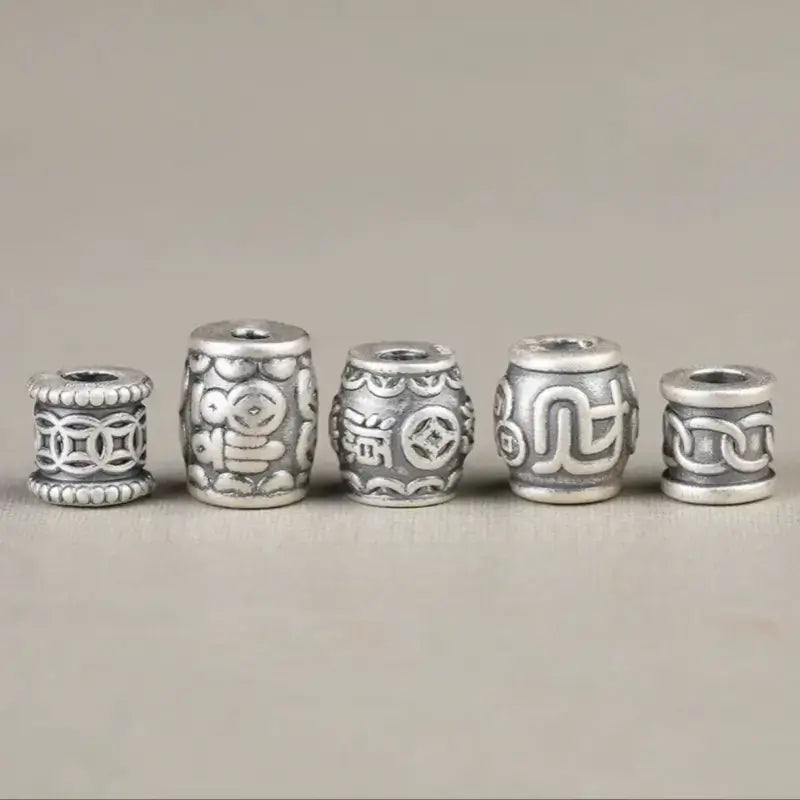 999 fine silver Lu Lu Tong barrel beads with auspicious Chinese fortune and coin motifs for DIY jewelry.