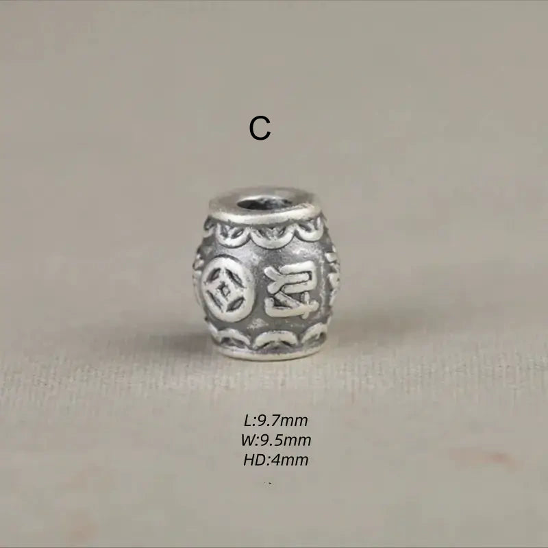 Style C 999 silver barrel bead engraved with Chinese fortune characters and coin symbols for DIY crafts.