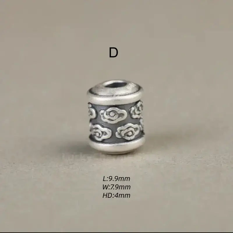 Style D 999 fine silver lucky cloud motif barrel bead component for DIY custom jewelry.