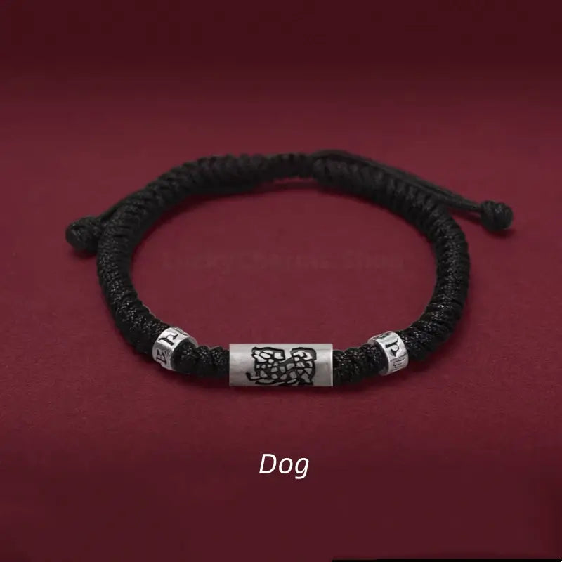 Chinese zodiac Dog men's black braided rope bracelet featuring a 925 sterling silver LuLuTong mantra bead.