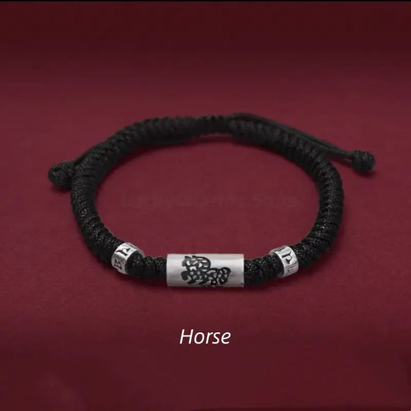 Chinese zodiac Horse men's black braided bracelet featuring a 925 sterling silver LuLuTong mantra bead.