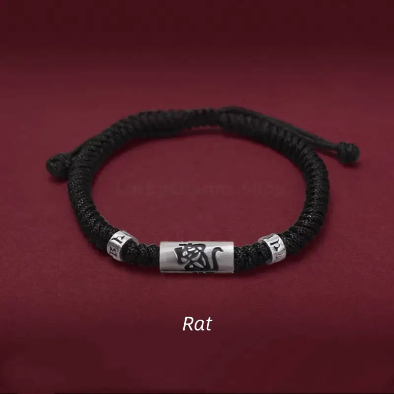 Chinese zodiac Rat men's black braided rope bracelet with a 925 sterling silver LuLuTong mantra tube bead.