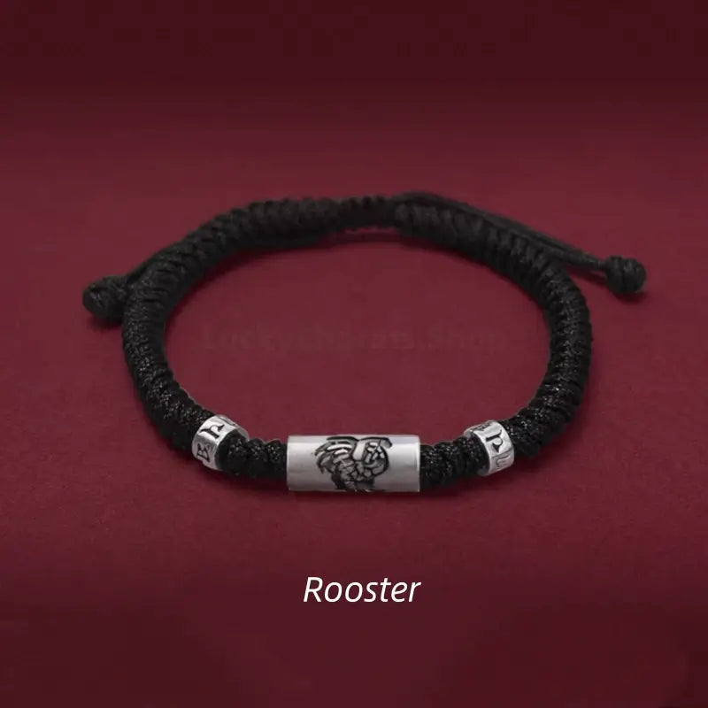 Chinese zodiac Rooster men's black braided rope bracelet with a 925 sterling silver LuLuTong mantra bead.