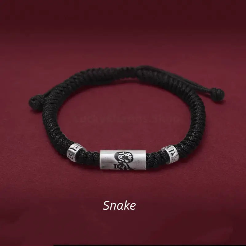 Chinese zodiac Snake men's black braided string bracelet featuring a 925 sterling silver LuLuTong mantra bead.