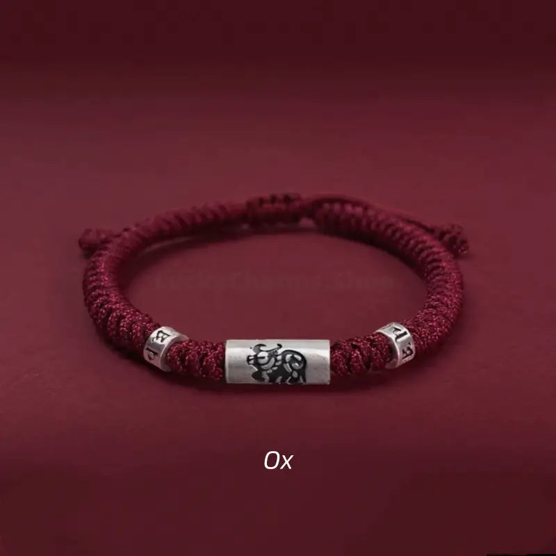 Ox 925 silver Chinese zodiac Lu Lu Tong red string bracelet with six-syllable mantra beads.