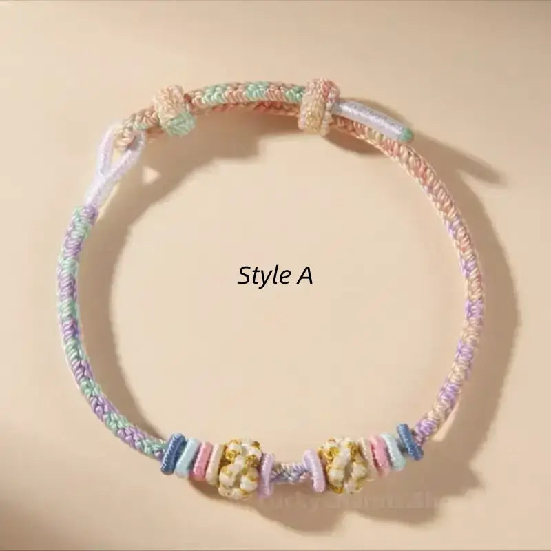 Style A colorful gradient braided rope bracelet with DIY peach blossom knot beads.