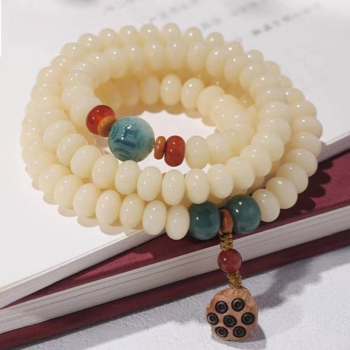 LuckyCharms White Jade Bodhi Lotus Seedpod Hand String