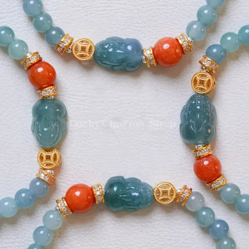 Blue Water Jadeite Pixiu Bracelet - Red Jadeite & Gold Accent Strand
