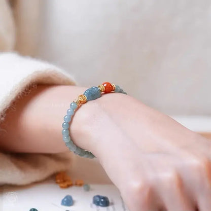 Blue Water Jadeite Pixiu Bracelet - Red Jadeite & Gold Accent Strand