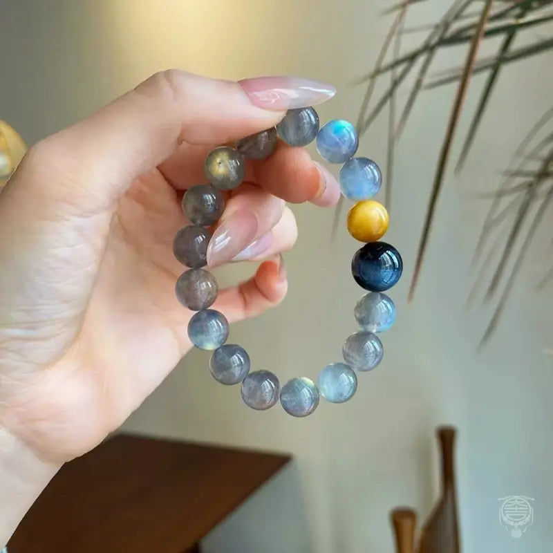 Edelsteinarmband aus mystisch grauem Mondstein und blau-goldenem Tigerauge