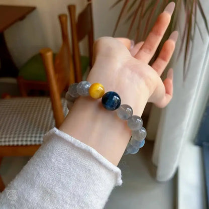 Edelsteinarmband aus mystisch grauem Mondstein und blau-goldenem Tigerauge