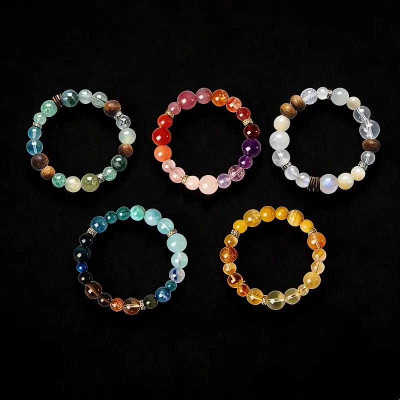 Natural crystal five elements single-strand bracelets set with healing gemstones and alloy spacers.