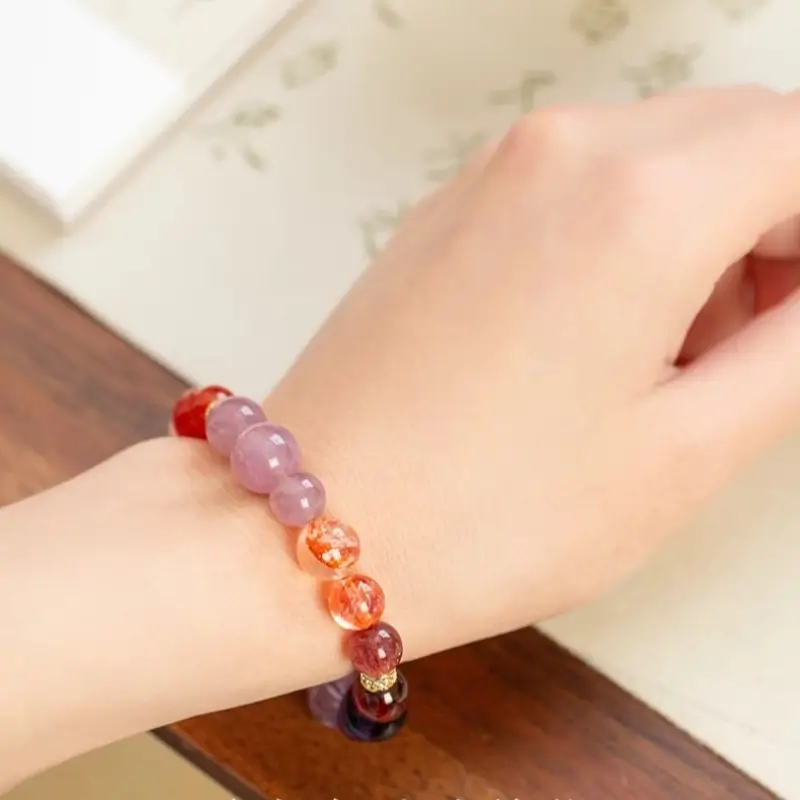 Fire element passion bracelet with rose quartz, red jelly flower, strawberry quartz, and amethyst.