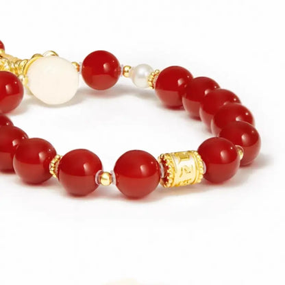 Prinz-Kung-Anwesen Set aus Rotachat- und Obsidian-Vajra-Paararmbändern