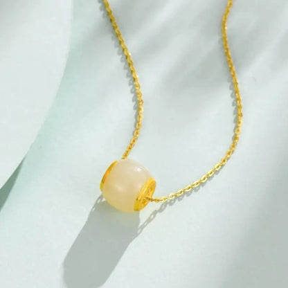 Collier pendentif Lu Lu Tong en jade Hetian incrusté d'or pur | Bijou élégant et porte-bonheur en forme de tonneau, idéal au quotidien ou à offrir