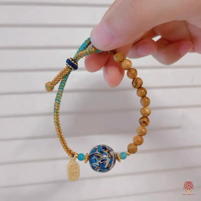 Heritage Lacquer & Gold-Thread Nanmu Wood Bracelet - Hand-Braided Cord