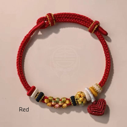 Bracelet tressé fait main en nœud de fleur de pêcher avec breloque cœur