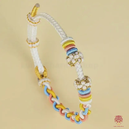 Bracelet tressé ajustable à nœud torsadé en forme de fleur de pêcher, facile à réaliser soi-même