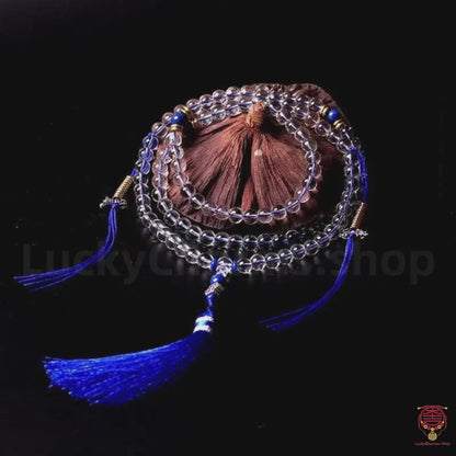 Le mala Clarté cristalline - Quartz clair haut de gamme baril de 8 mm avec pompon Dynastie éthérée