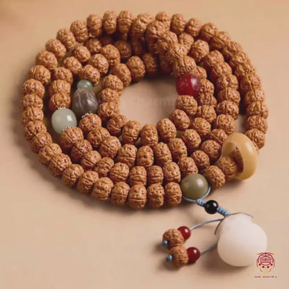 The Putuo Sanctuary Mala - Blessed 108 Rudraksha with White Jade Charms