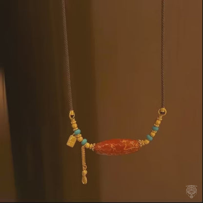 Collier pendentif perle laquée Heritage | Ras-du-cou gravé de motifs Tang Grass