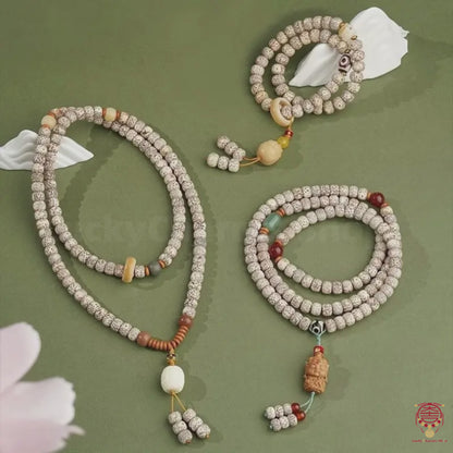 Le mala Constellation himalayenne - Bodhi Potala béni par les étoiles et la lune, avec des amulettes sacrées sculptées